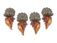 A Set of Four Italian Carved, Painted and Parcel Gilt "Grotto" Style Wall Brackets