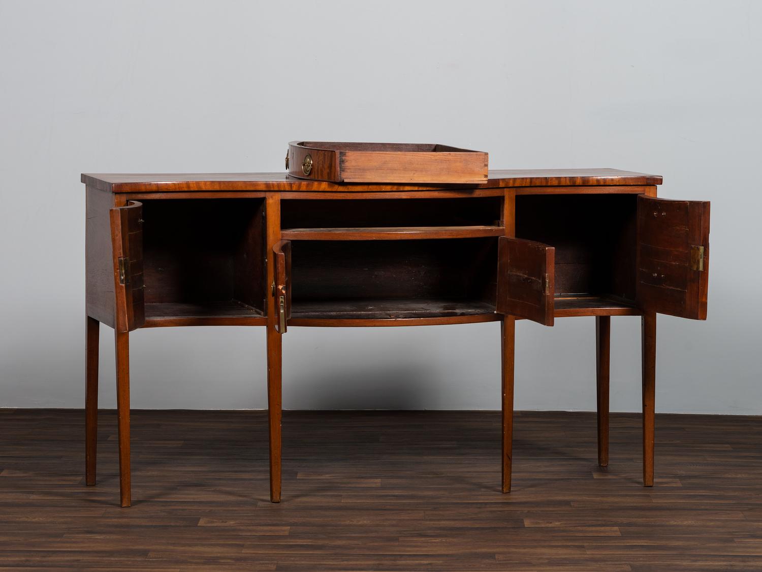 A Federal Figured Mahogany Serpentine Sideboard