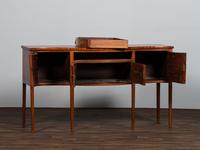 A Federal Figured Mahogany Serpentine Sideboard