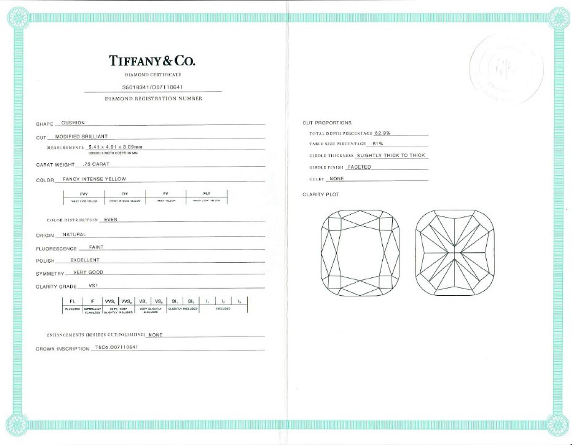 TIFFANY & CO., 'SOLESTE' FANCY INTENSE YELLOW DIAMOND AND DIAMOND STUD EARRINGS
