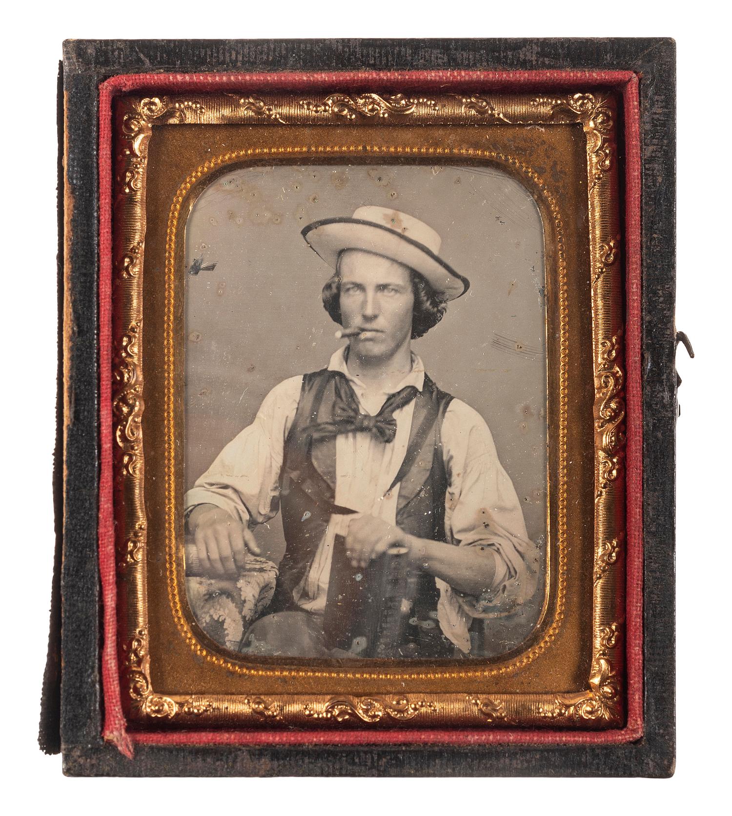 [EARLY PHOTOGRAPHY]. Ninth plate occupational daguerreotype of worker wearing a straw hat, smoking a cigar.