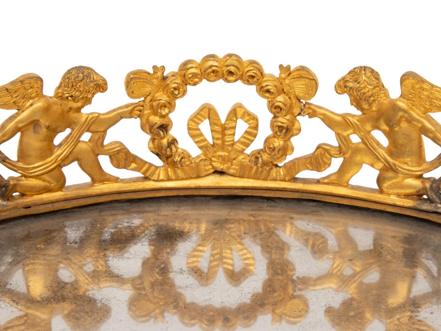 A Louis-Philippe Gilt Bronze Surtout de Table and a Pair of Restauration Gilt Bronze Urns