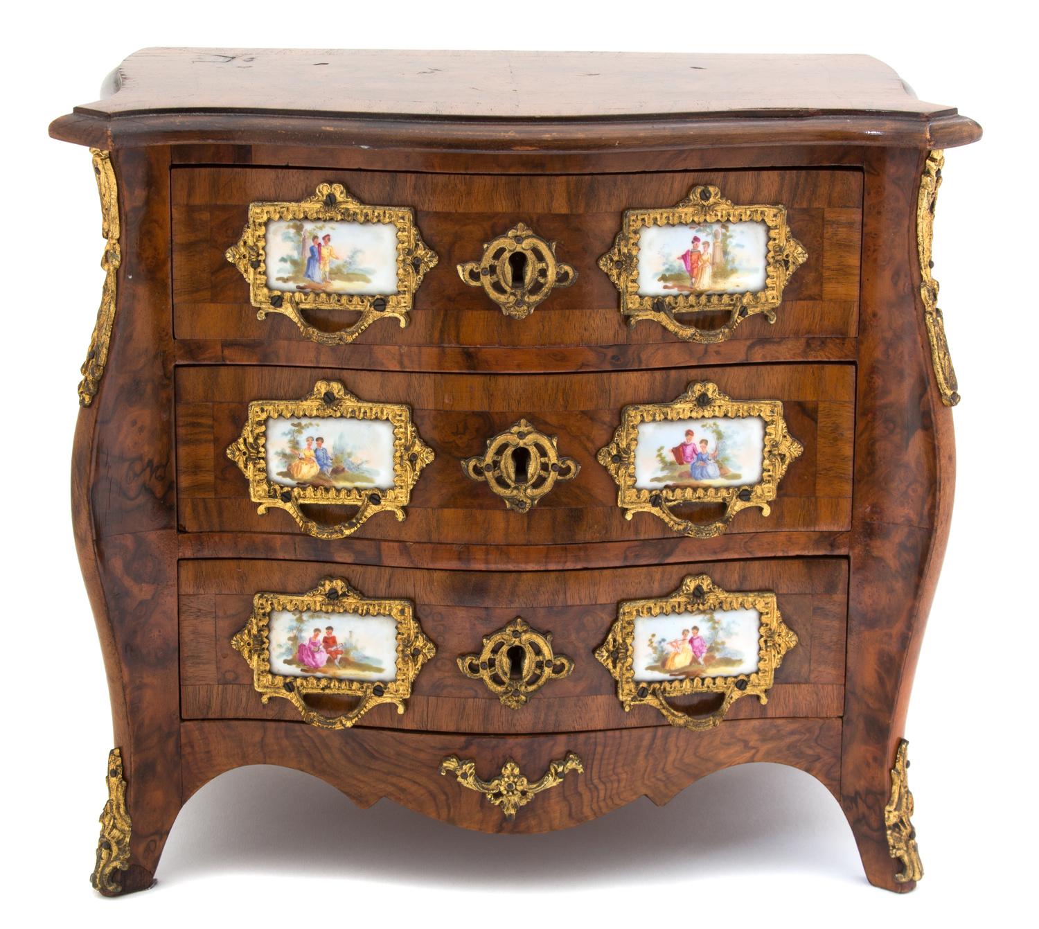 A Louis XV Style Porcelain and Gilt Metal Mounted Miniature Bombe Chest of Drawers — EARLY 20TH CENTURY
