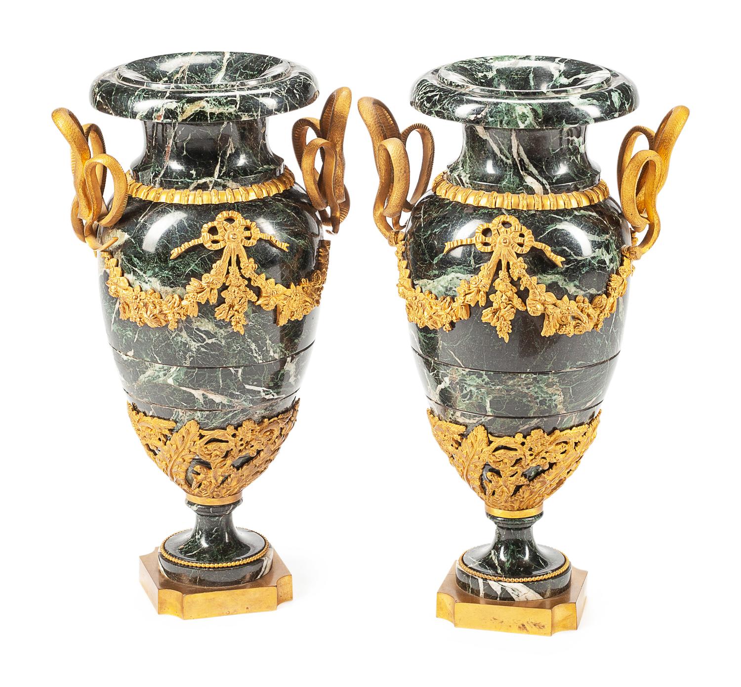 A Pair of Louis XVI Style Gilt Bronze Mounted Marble Urns