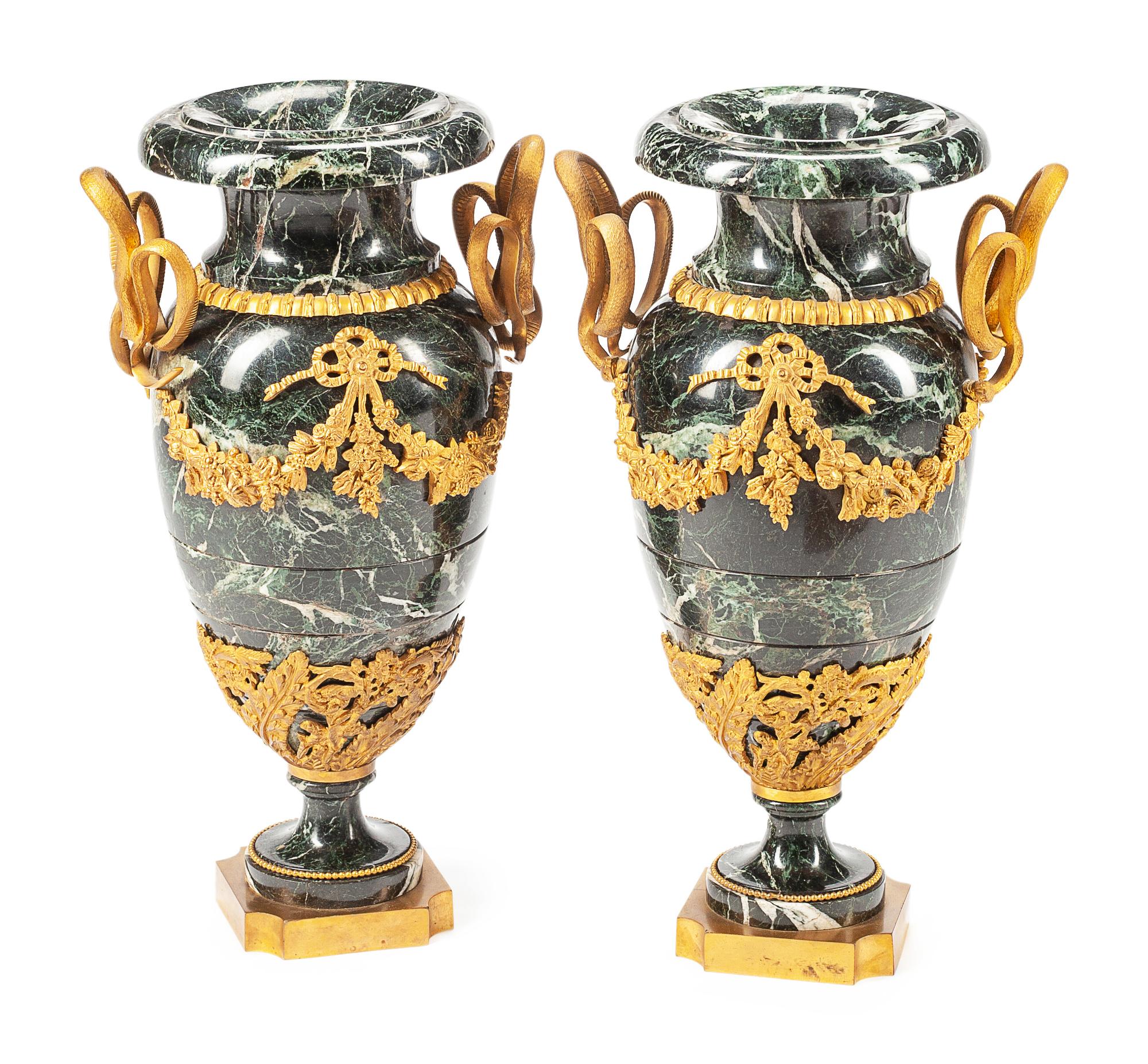 A Pair of Louis XVI Style Gilt Bronze Mounted Marble Urns