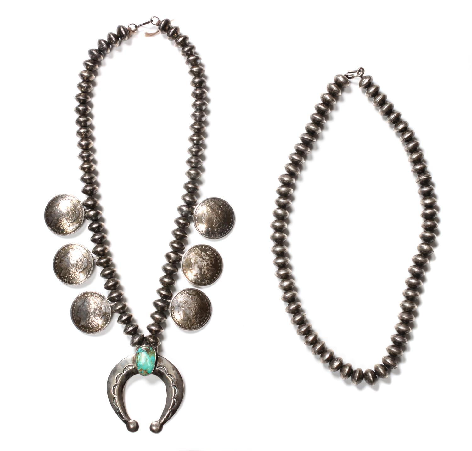 A Navajo Squash Blossom Necklace Length of the first 24 inches; naja height 2 1/2 x width 3 inches.