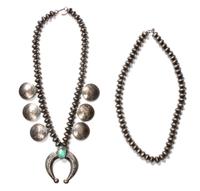 A Navajo Squash Blossom Necklace Length of the first 24 inches; naja height 2 1/2 x width 3 inches.