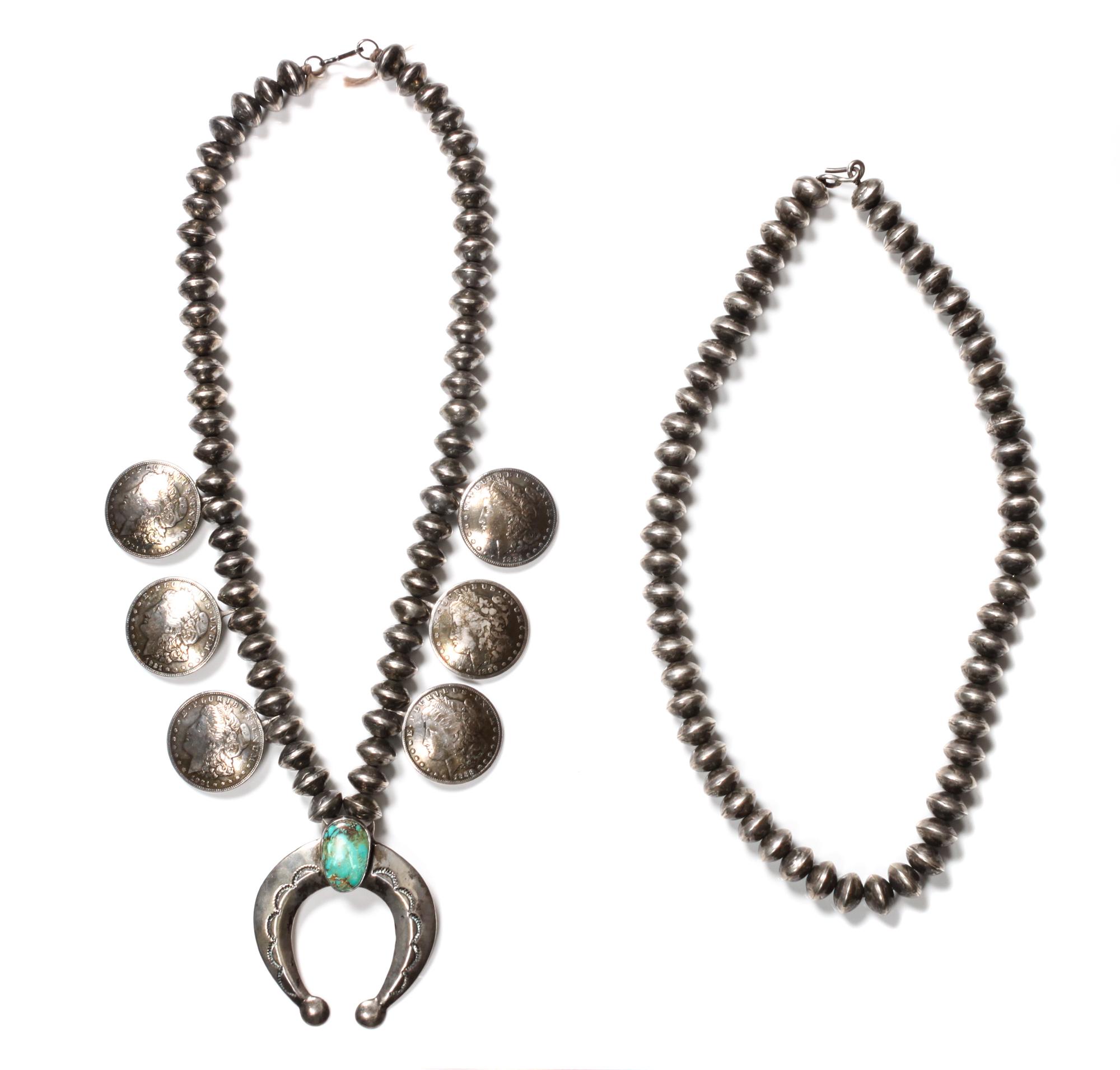 A Navajo Squash Blossom Necklace Length of the first 24 inches; naja height 2 1/2 x width 3 inches.