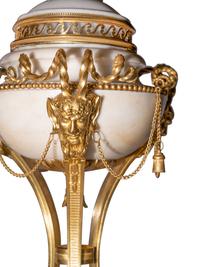 A Pair of Late Louis XVI Gilt Bronze Mounted White Marble Cassolettes