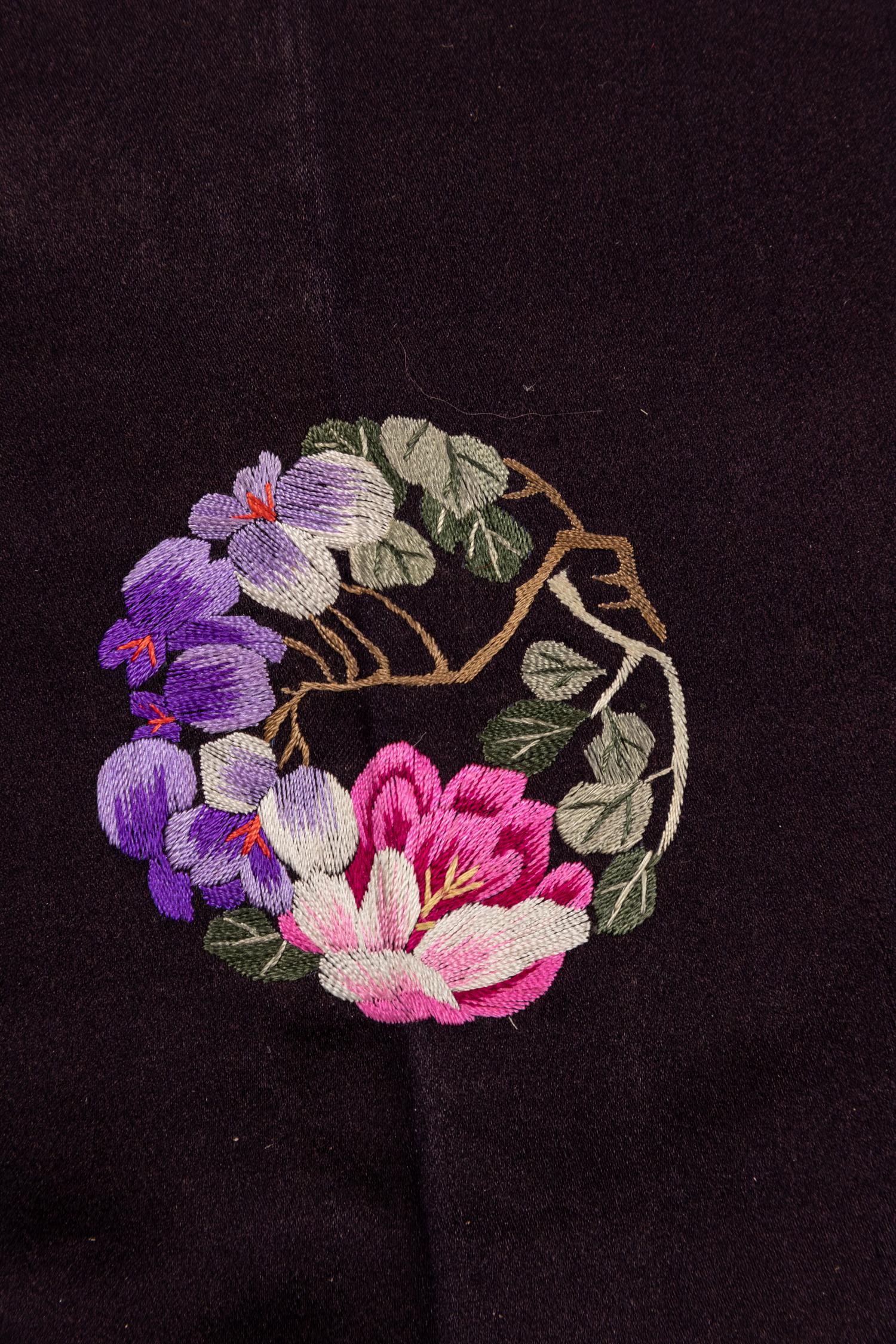 A Set of Aubergine Satin Ground Embroidered Silk Lady's Robe and Skirt