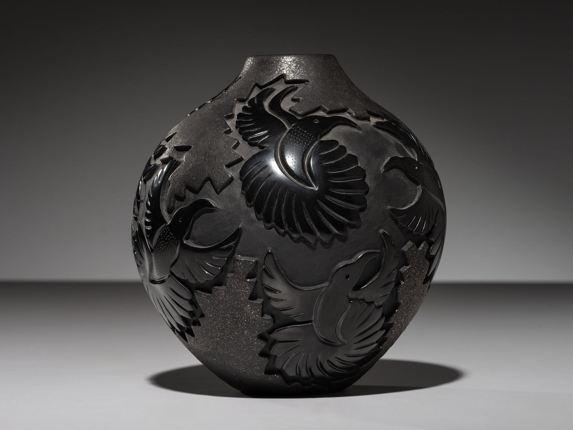 Carved Micaceous Blackware Jar, with Hummingbirds