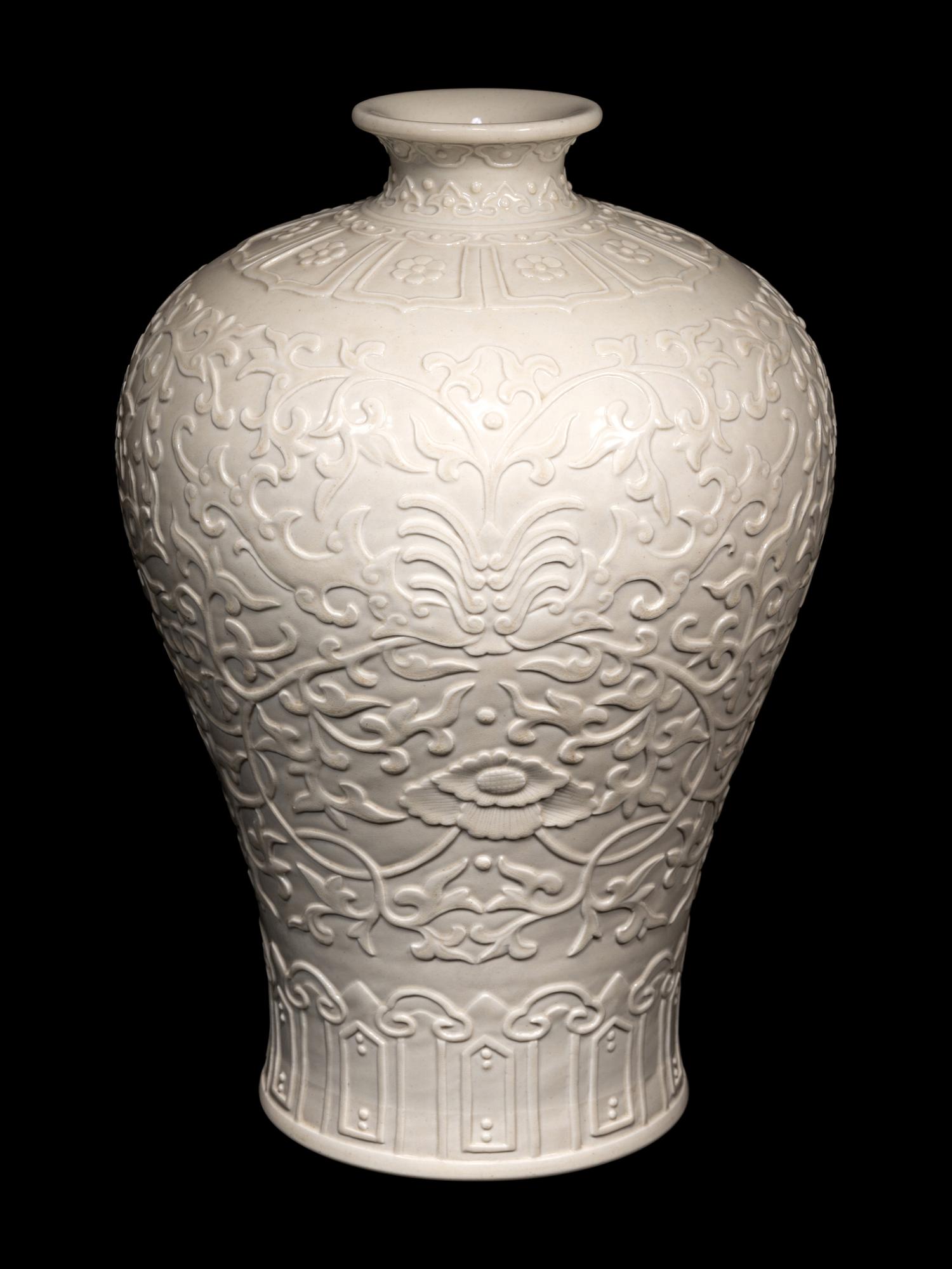 A Carved White Glazed Porcelain Meiping Vase