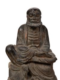 A Chinese Carved Stone Seated Figure