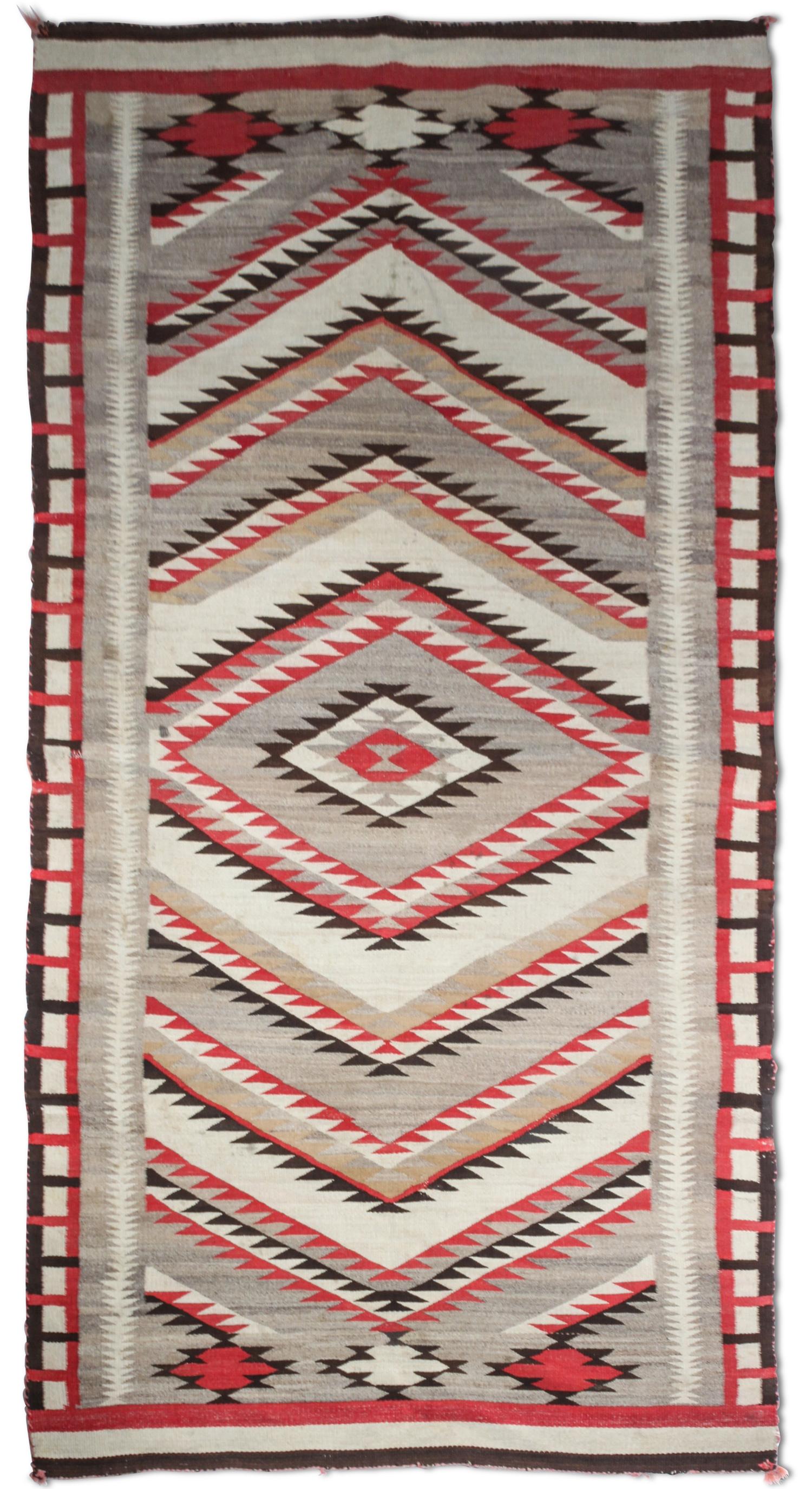 A Navajo Ganado Rug First: 107 1/2 x 45 1/2 inches. — CIRCA 1920