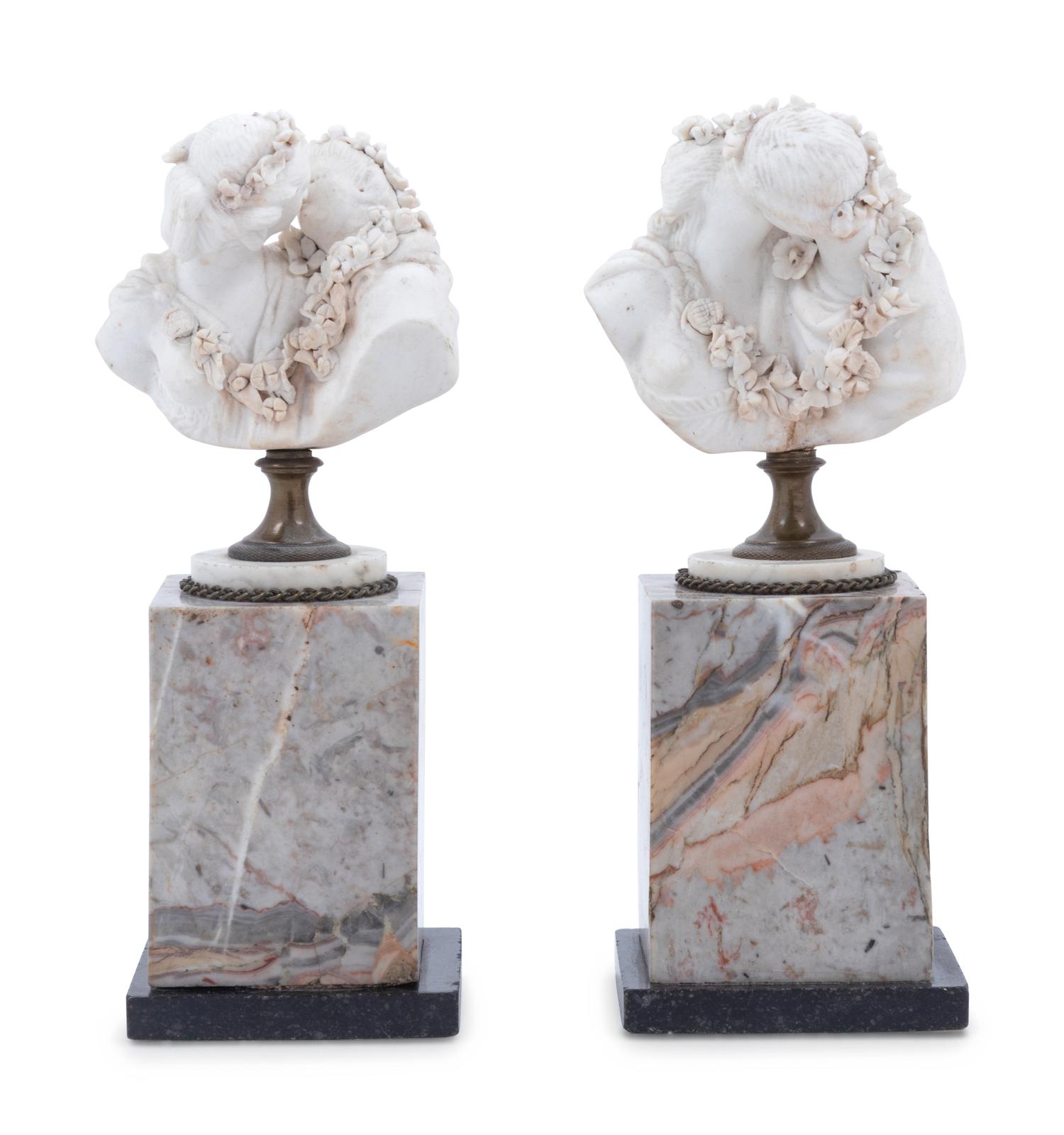 A Pair of Bisque Busts on Marble Bases