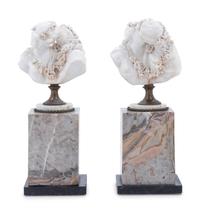A Pair of Bisque Busts on Marble Bases