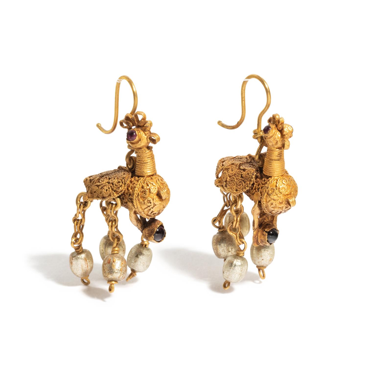 A Pair of Byzantine or Islamic Gold and Amethyst Earrings in the Form of Doves