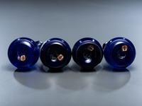 Four 'Mary Gregory' Cobalt Glass Barber Bottles