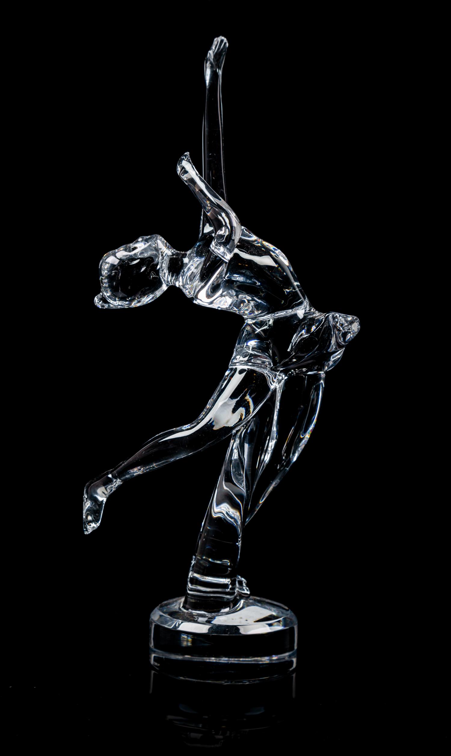 A Baccarat Molded Glass Figure Height 12 inches.