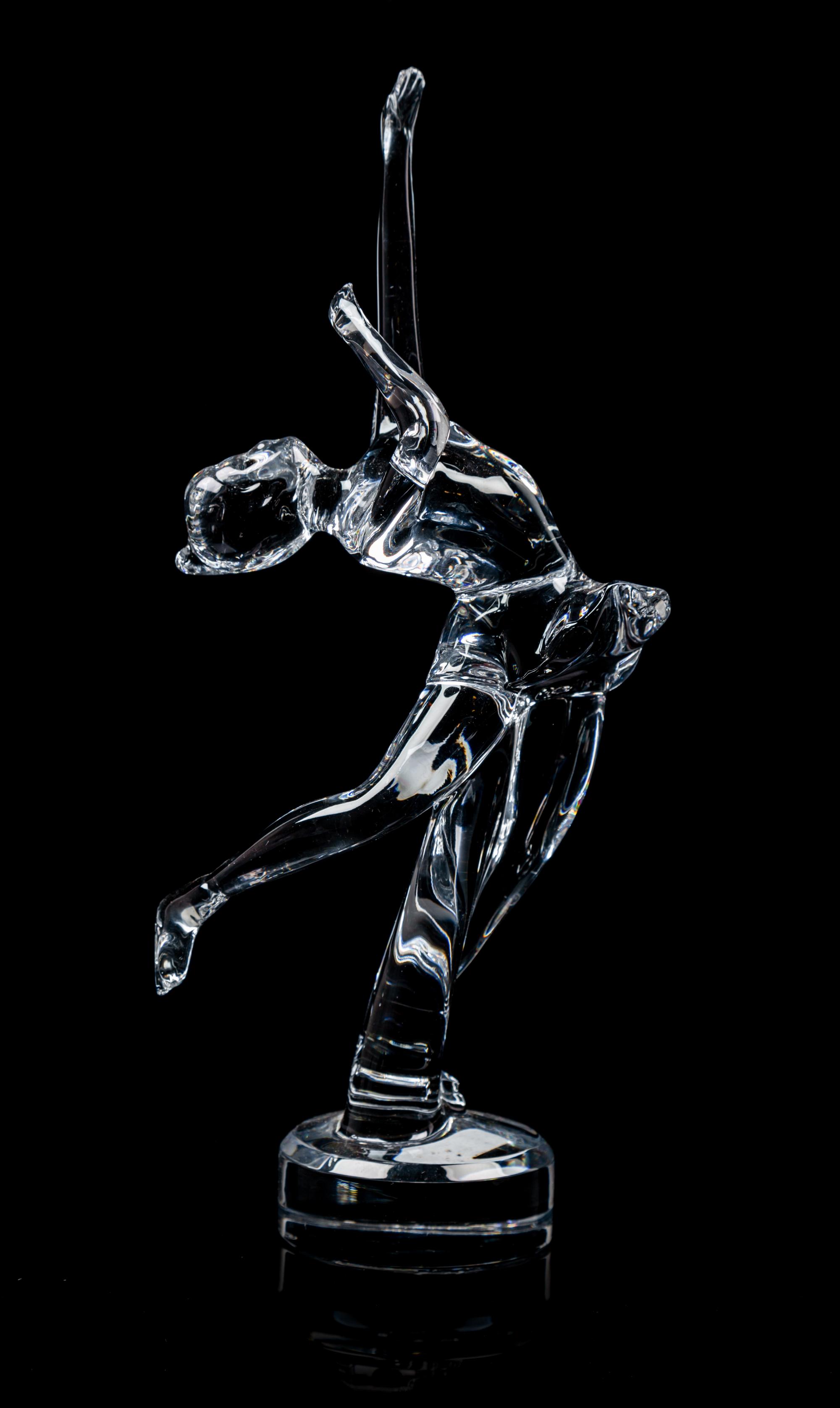 A Baccarat Molded Glass Figure Height 12 inches.