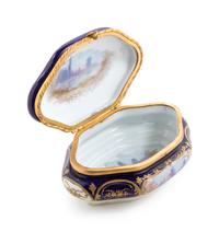 A Sèvres Style Painted and Parcel Gilt Porcelain Table Casket