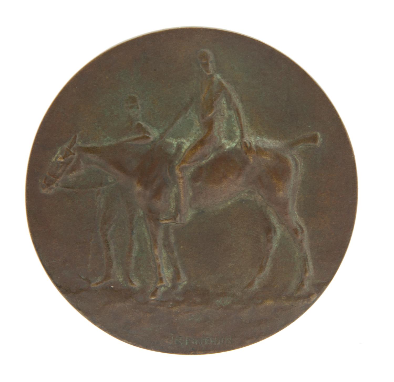 Emile Pinchon, (French, b. 1872), Polo de Cannes bronze medallion with polo players and pony on face, the verso with a wooded landscape
