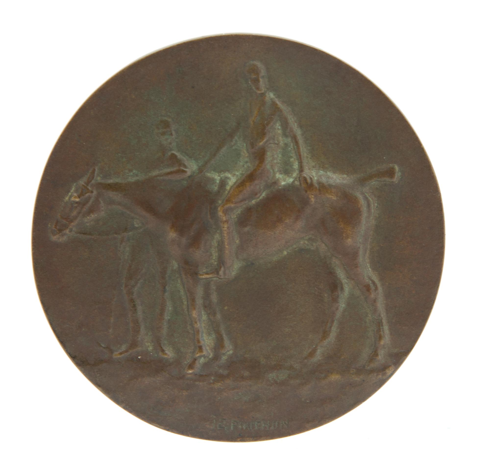 Emile Pinchon, (French, b. 1872), Polo de Cannes bronze medallion with polo players and pony on face, the verso with a wooded landscape
