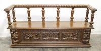 A Continental Carved Walnut Hall Bench. Width 74 inches.