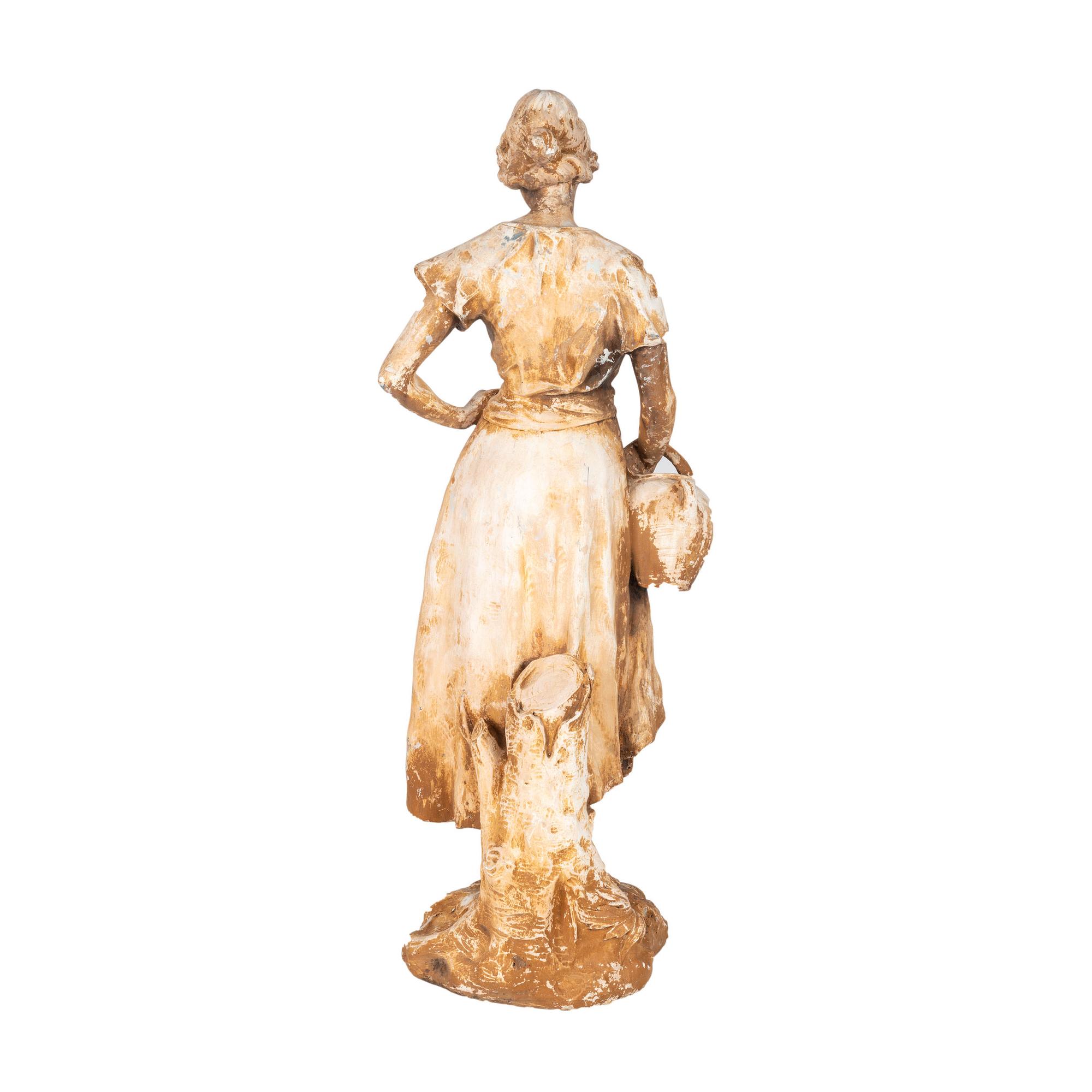 A French Terra Cotta Figure of a Farm Girl