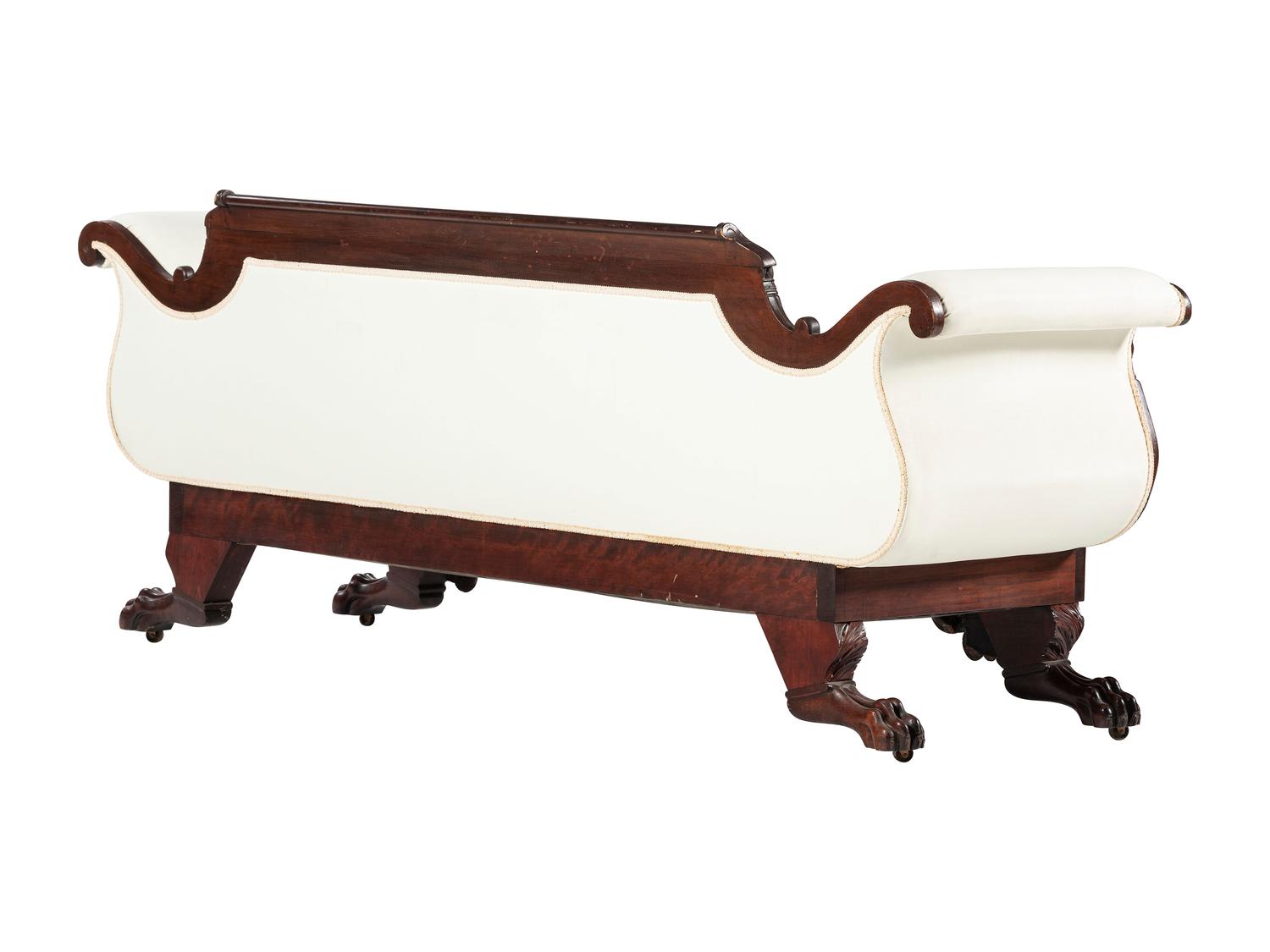 A Late Classical Carved Mahogany Sofa