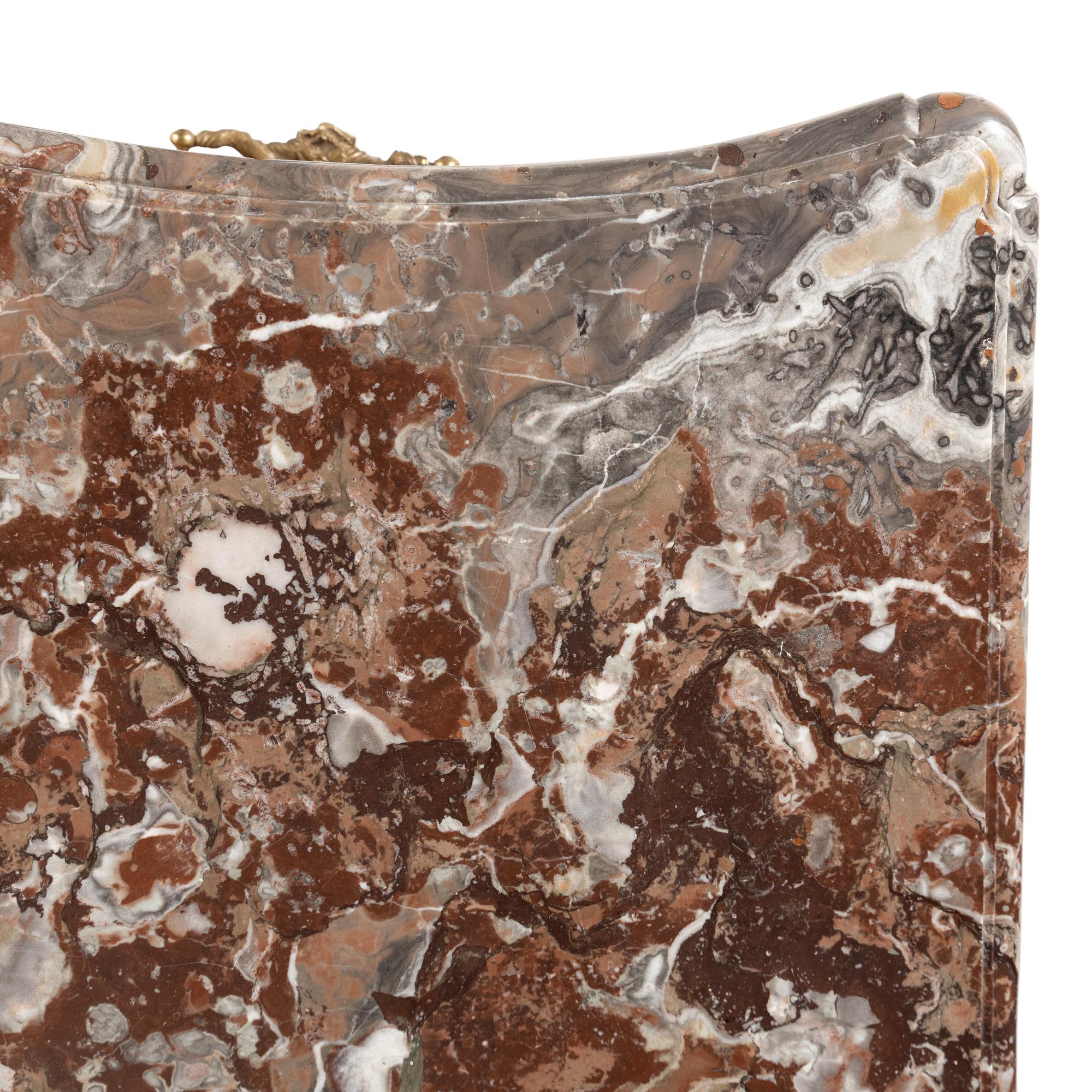 A Louis XV Gilt Bronze Mounted Marble-Top Kingwood Commode