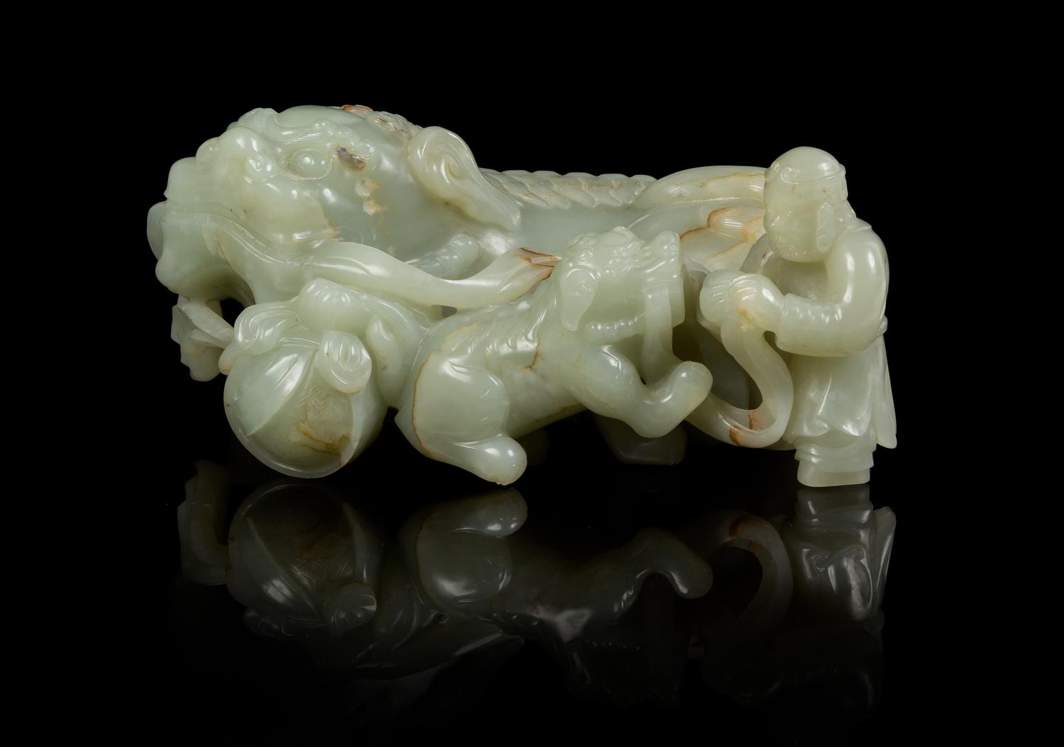 A Celadon Jade Figural Group LATE 19TH/EARLY 20TH CENTURY Length 6 1/4 inches. — LATE 19TH/EARLY 20TH CENTURY