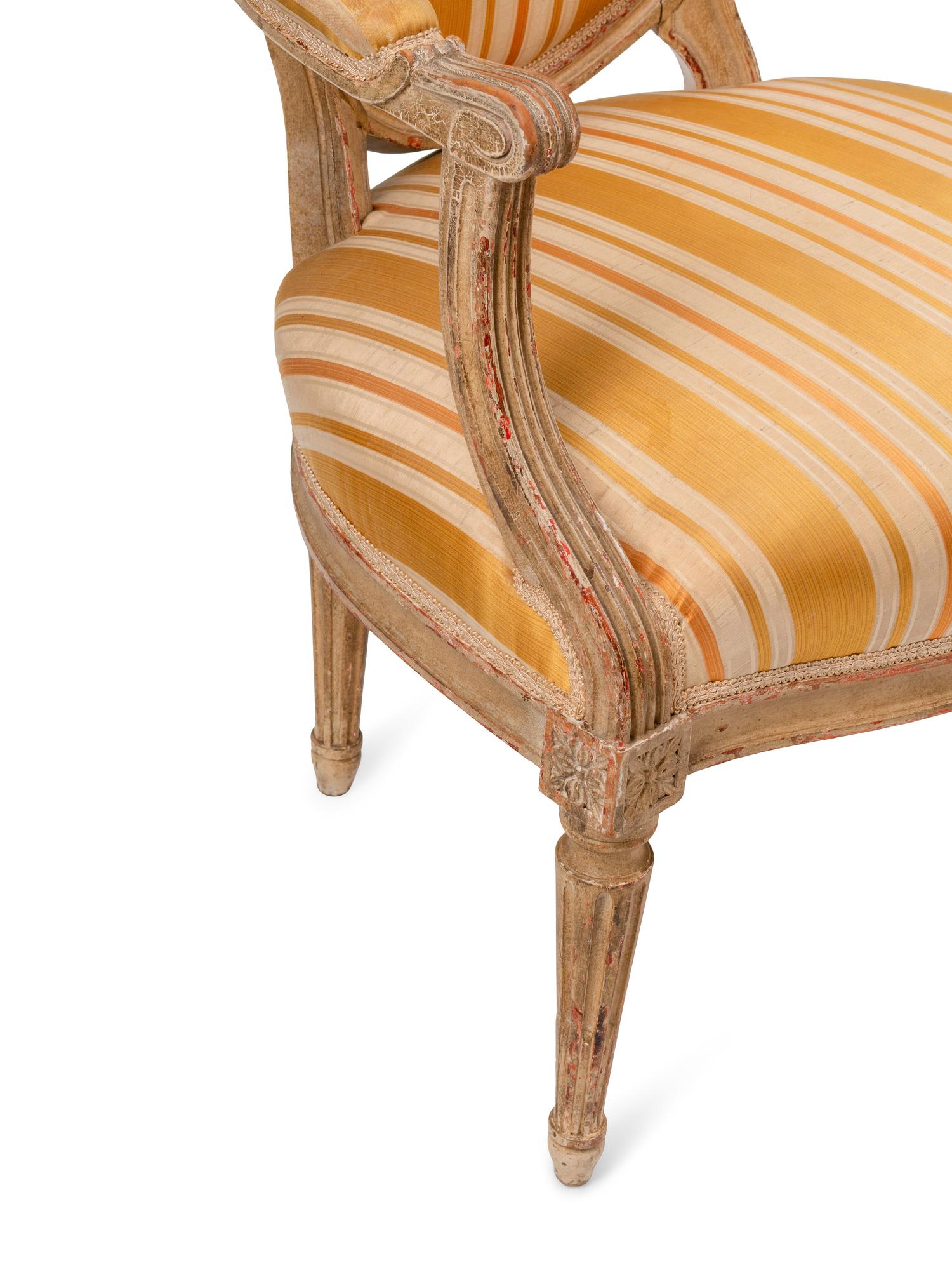 A Pair of Louis XVI Painted Fauteuils