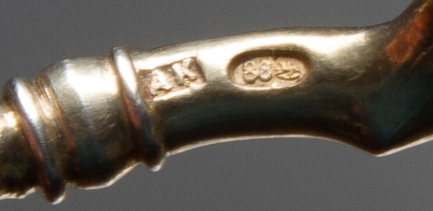 Two Russian Silver-Gilt and Enamel Spoons, Maker's mark Cyrillic AK, Moscow, late 19th/early 20th century, each having a polychrome ena