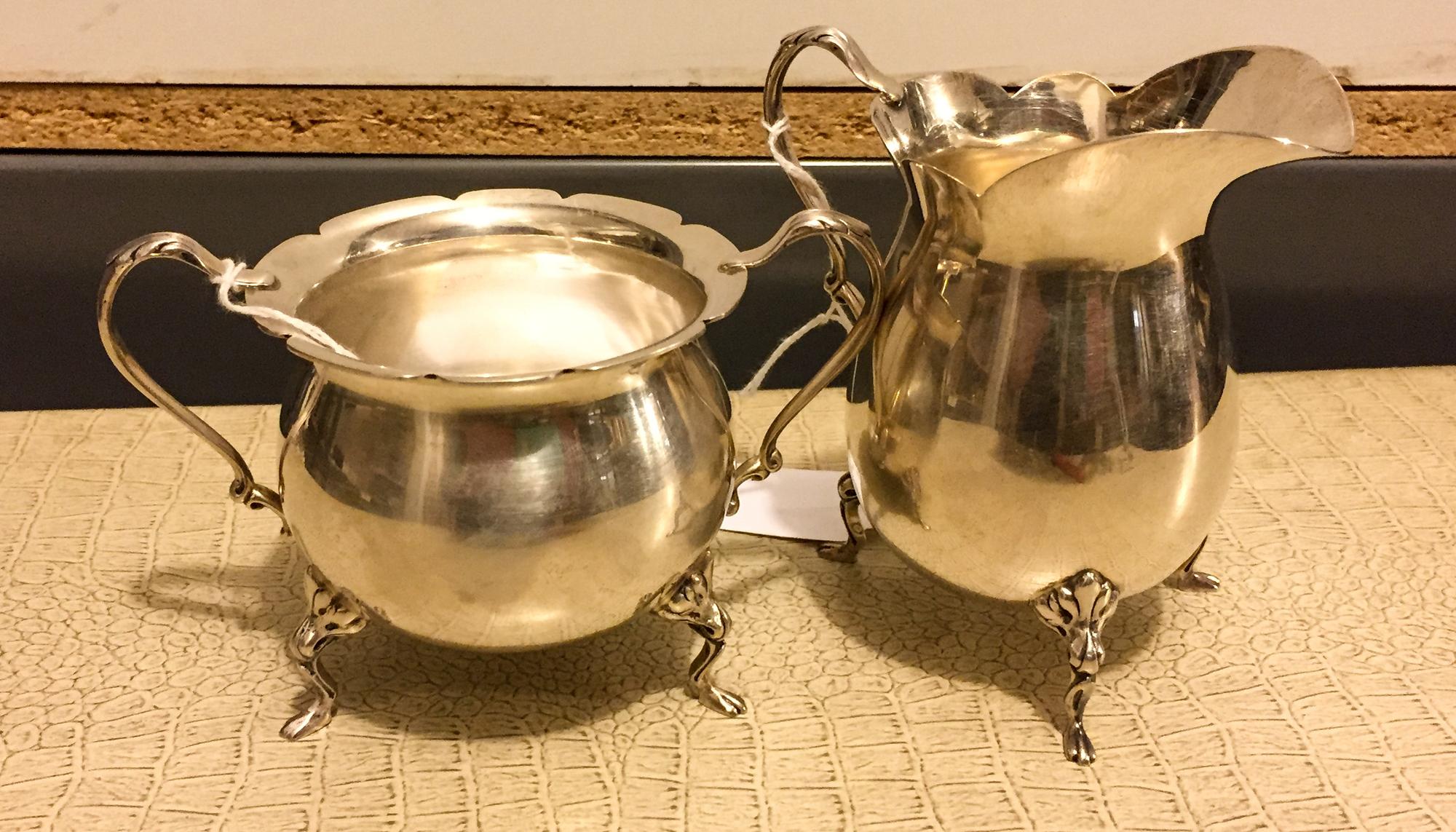 An American Silver Sugar and Creamer Set, Luraline, each having a scalloped rim.