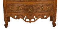 A French Provincial Carved Oak Commode