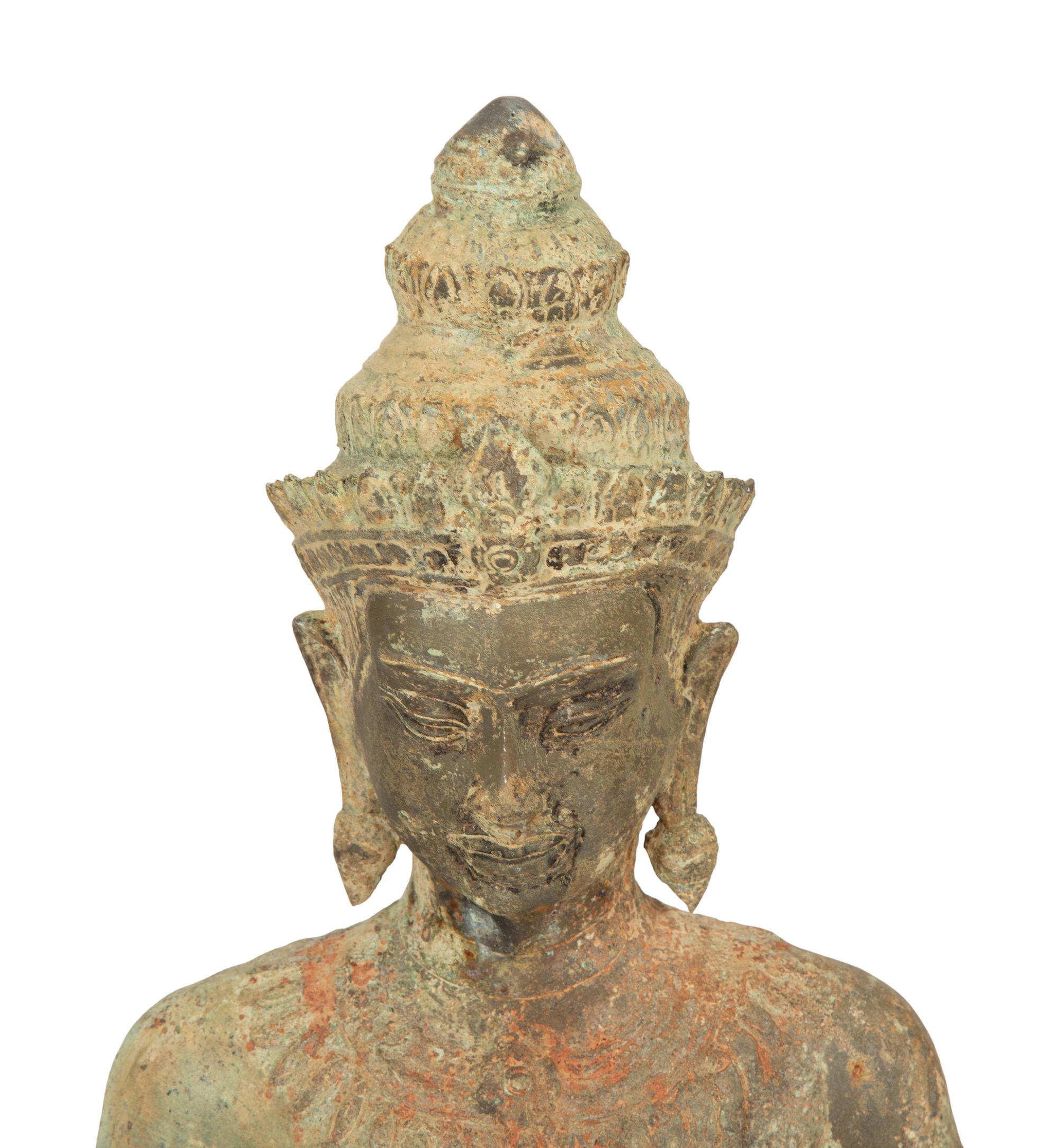 A Southeast Asian Polychrome-Painted Bronze Seated Bodhisattva