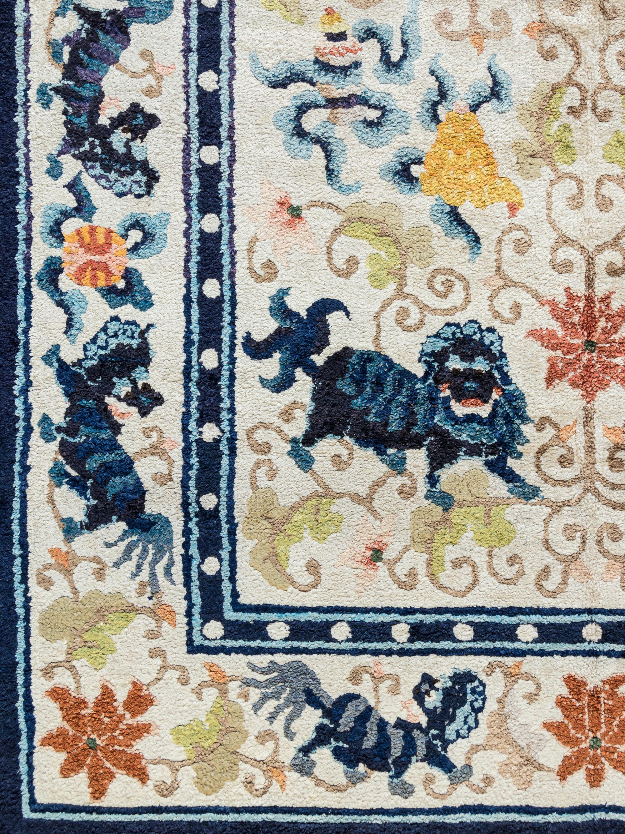 A Chinese Silk Rug with Lions