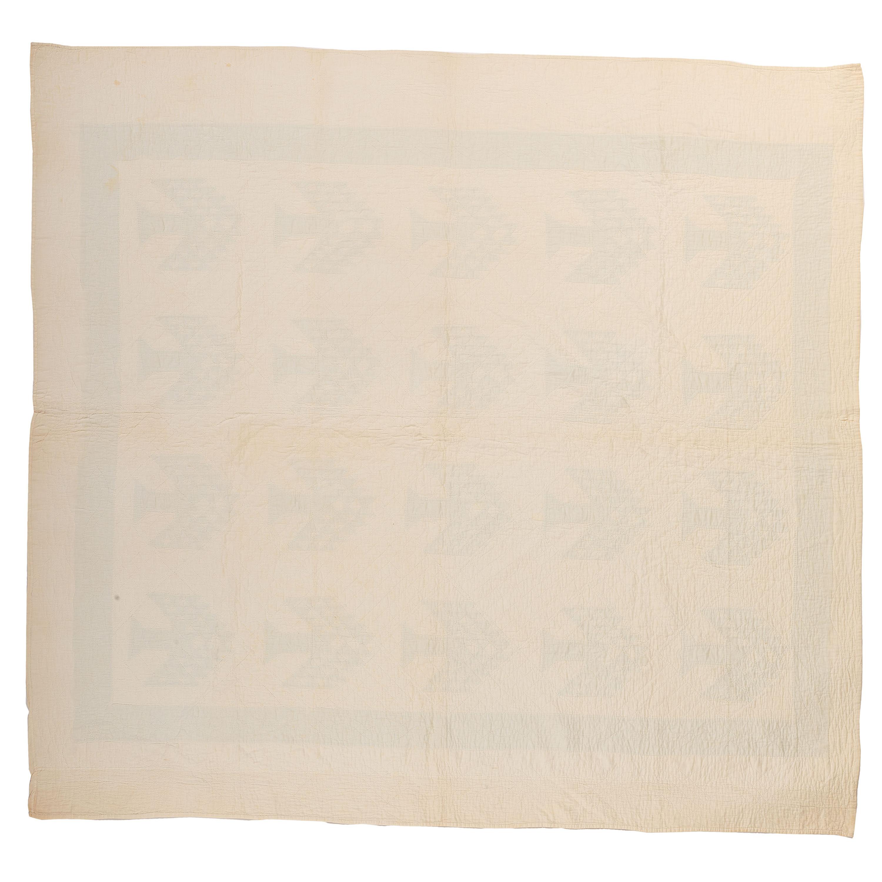 A Green and White Tree of Life Quilt