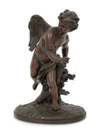 A French Bronze Figure of Eros on a Wood Base