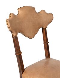 A Set of Twelve Spanish Baroque Style Dining Chairs