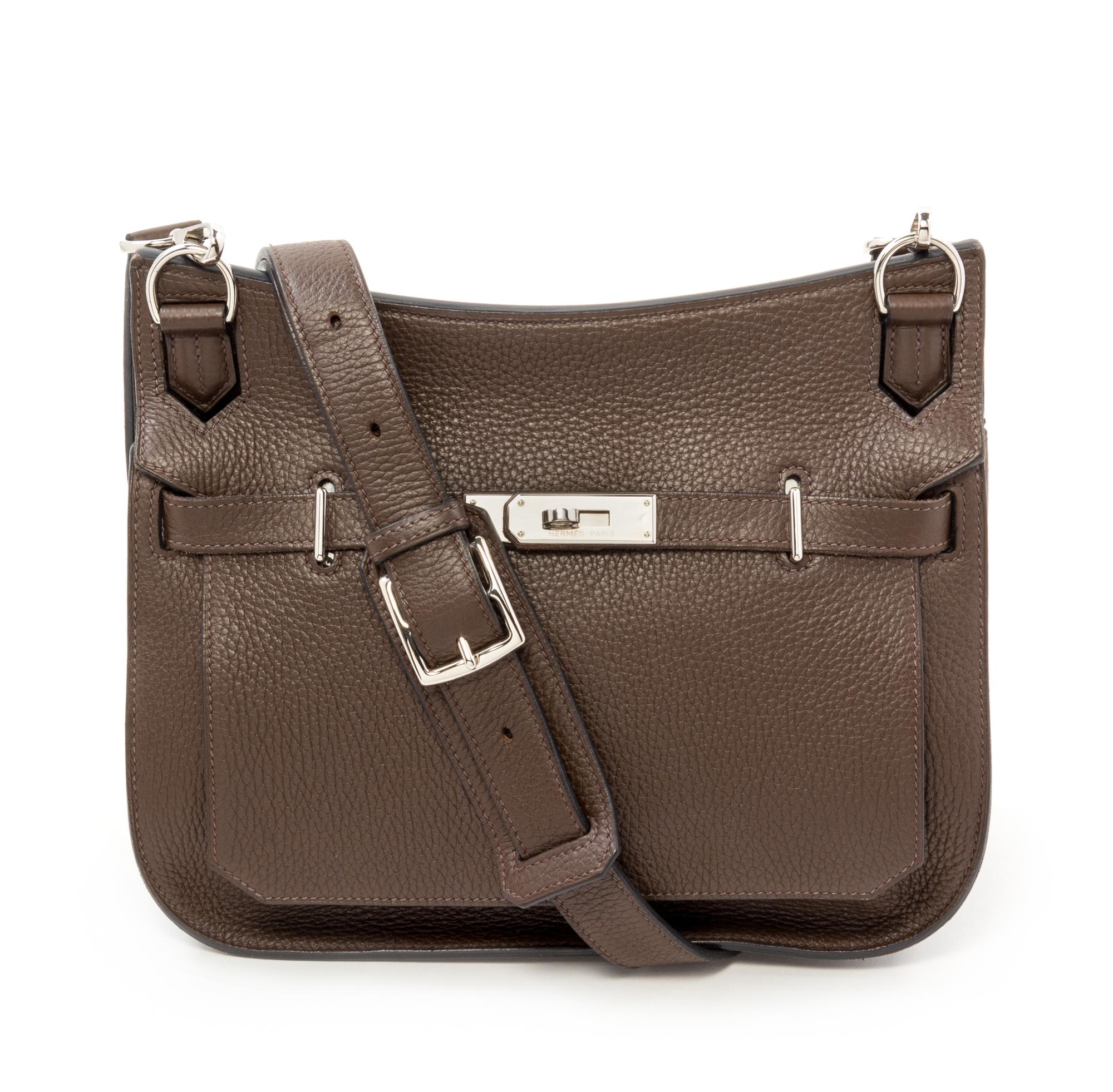An Hermès Chocolate Taurillon Clemence Jypsiere 28cm Bag, 11" x 8.5" x 5".