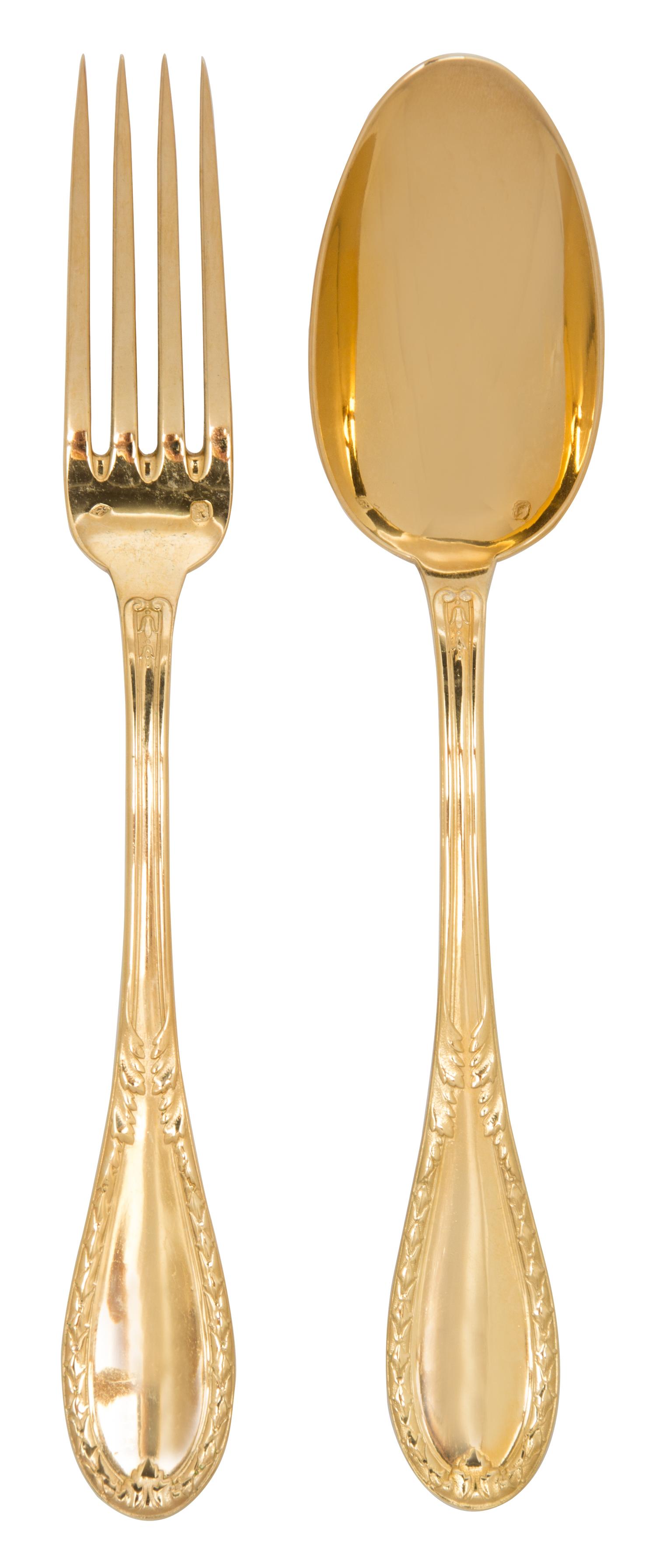 A Collection of French Gold-Plated Flatware, , comprising 16 dinner forks and 14 place spoons, monogrammed.