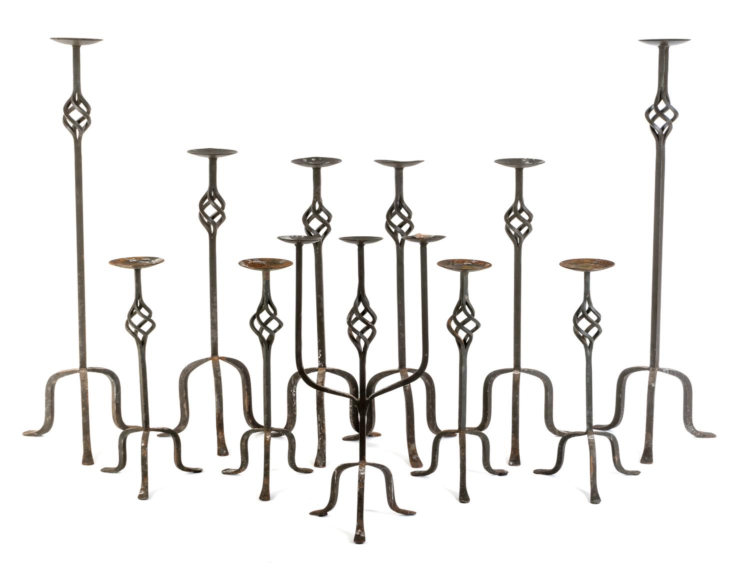 A Collection of Eleven Mizner Style Wrought Iron Candlestands — 20TH CENTURY