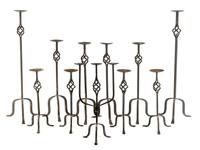 A Collection of Eleven Mizner Style Wrought Iron Candlestands — 20TH CENTURY