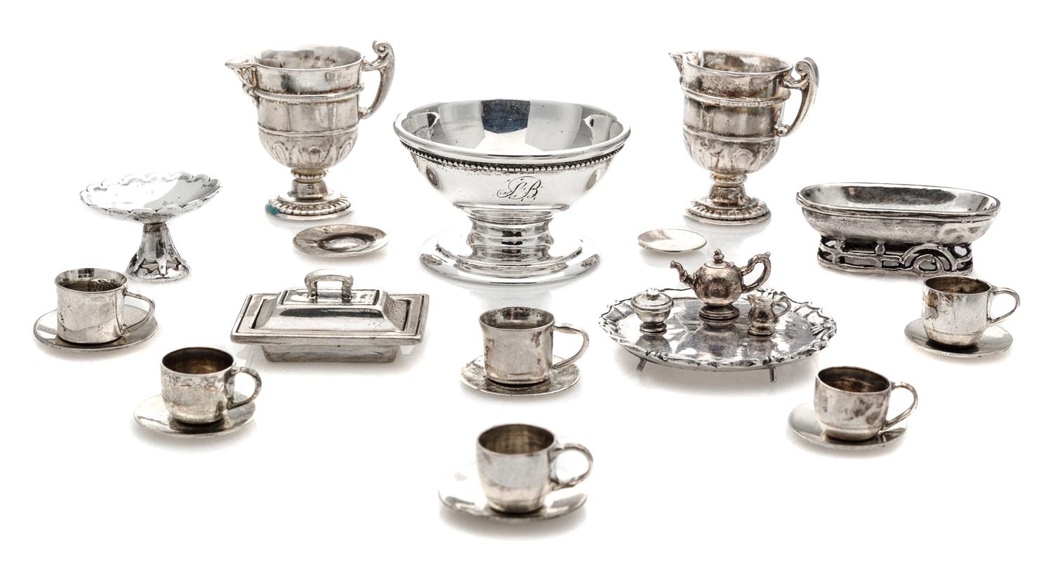 A Collection of American and English Silver Table Articles, Various Makers, comprising a footed center bowl; an oval bread tray with a
