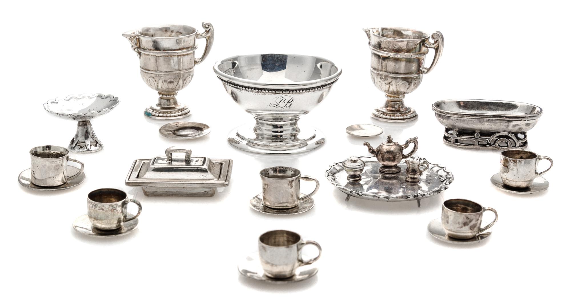 A Collection of American and English Silver Table Articles, Various Makers, comprising a footed center bowl; an oval bread tray with a