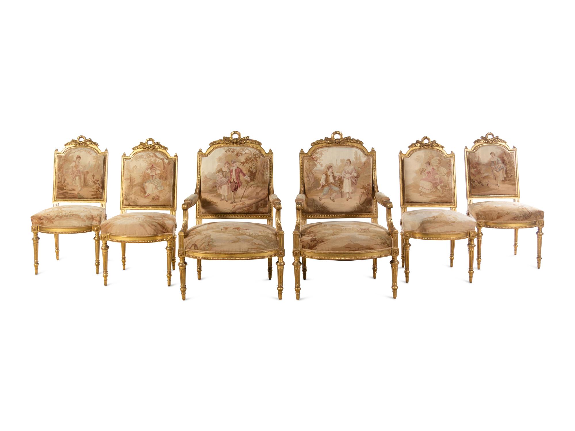 A Louis XVI Style Giltwood Seven-Piece Seating Suite with Aubusson Tapestry Upholstery