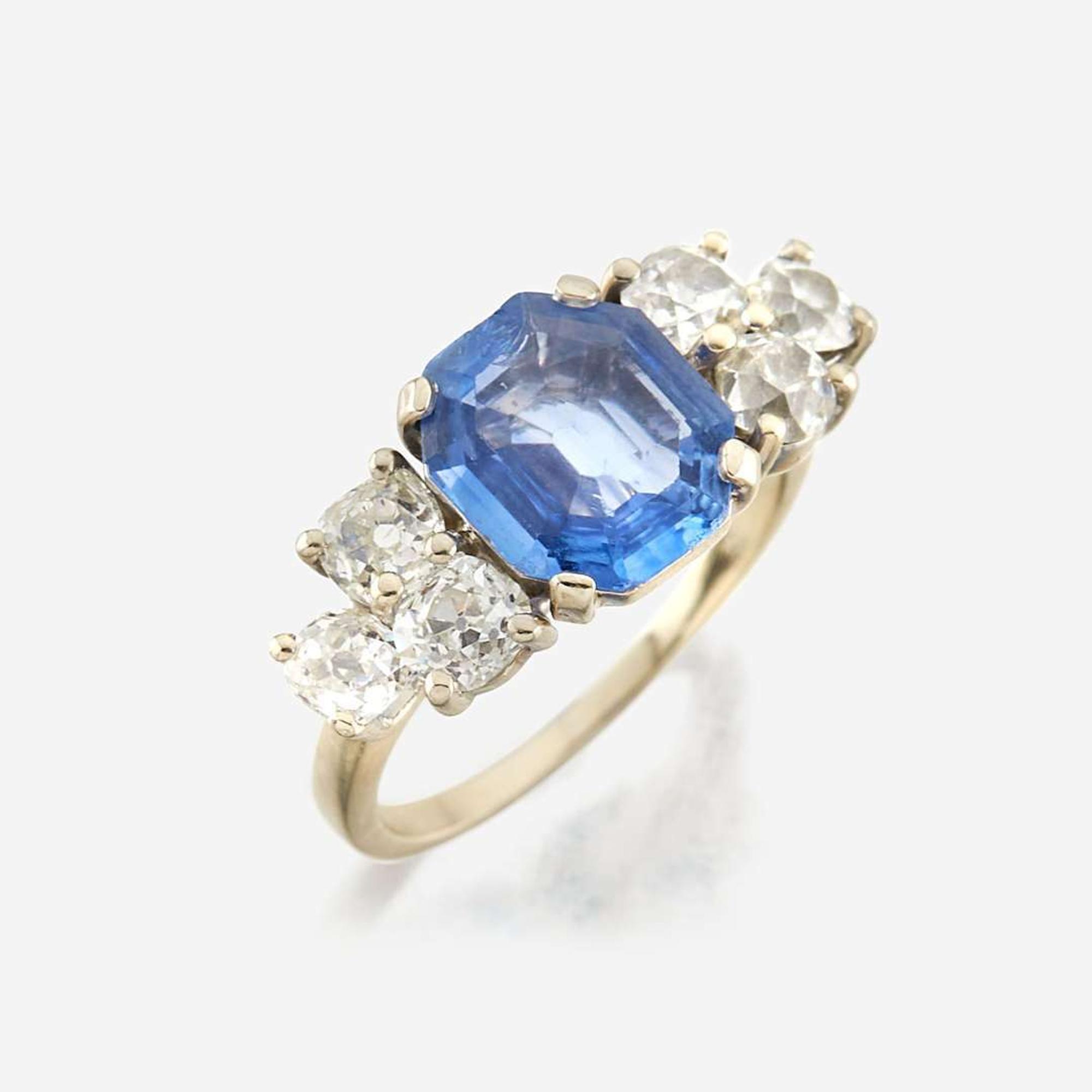 A sapphire, diamond, and white gold ring
