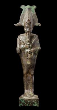 An Egyptian Bronze Standing Osiris Height 11 inches. — LATE PERIOD, DYNASTY 26-30, 664-343 B.C.E.